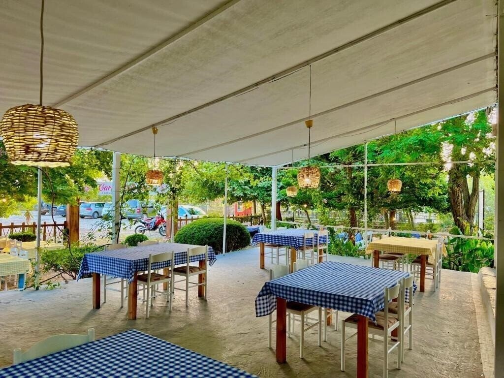 Garden Villa Naza Apt апартаменты суреті