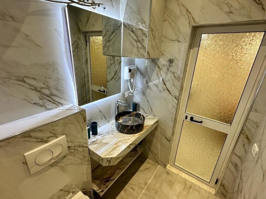 Troy Apt апартаменты фотосуреті