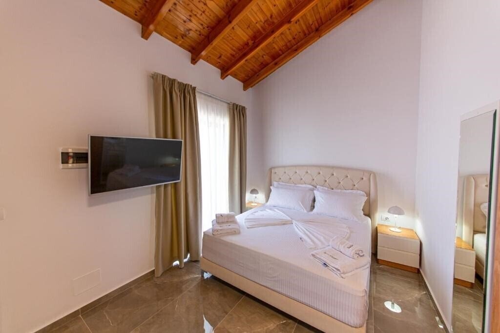 Фото Santa Oliva Suites 4*