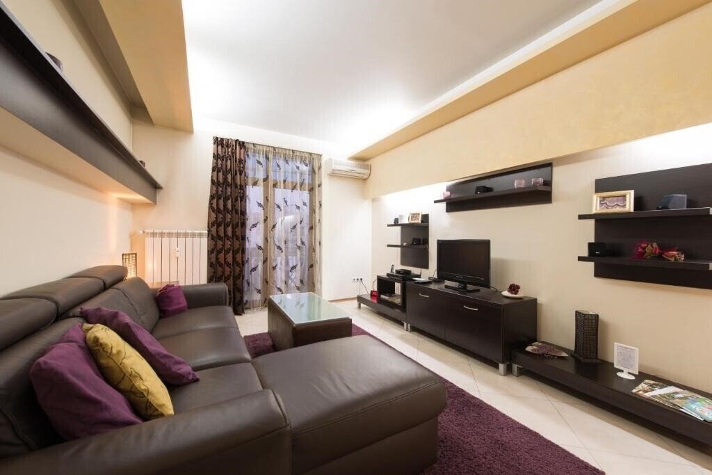 Отель City Apartments 4*