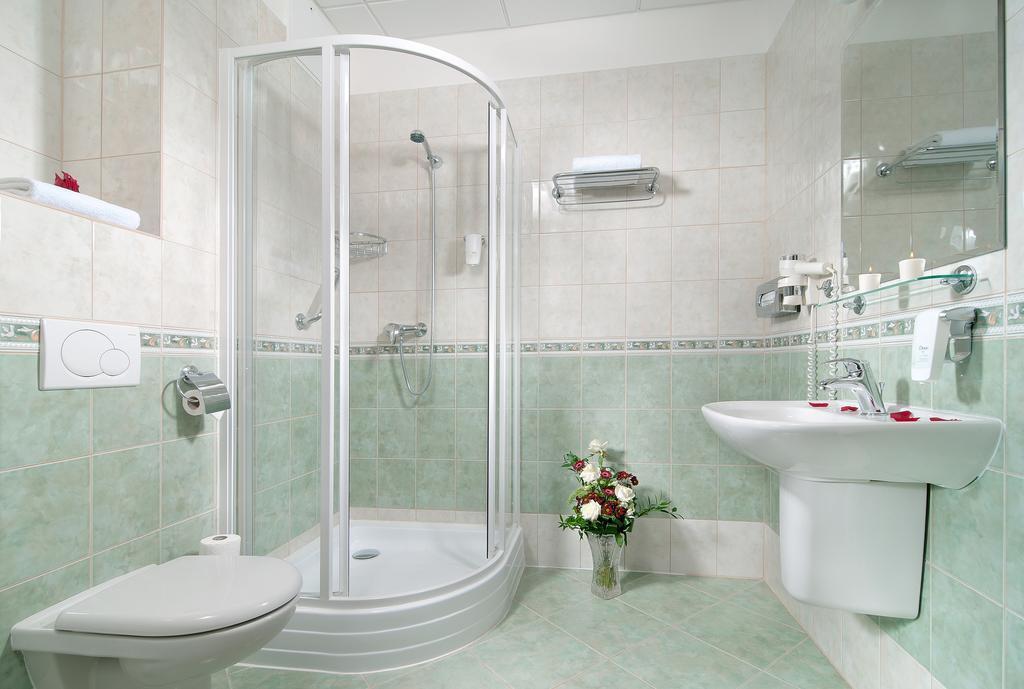 Amigo City Centre 4* фотосуреті