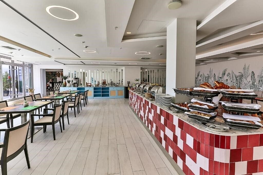 Фотография Hotel TQ Plaza 4*