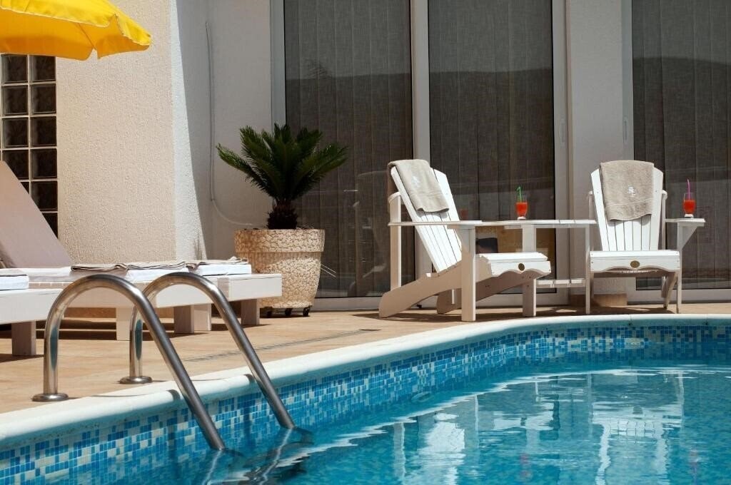 Kamelija Apartments 4* суреті