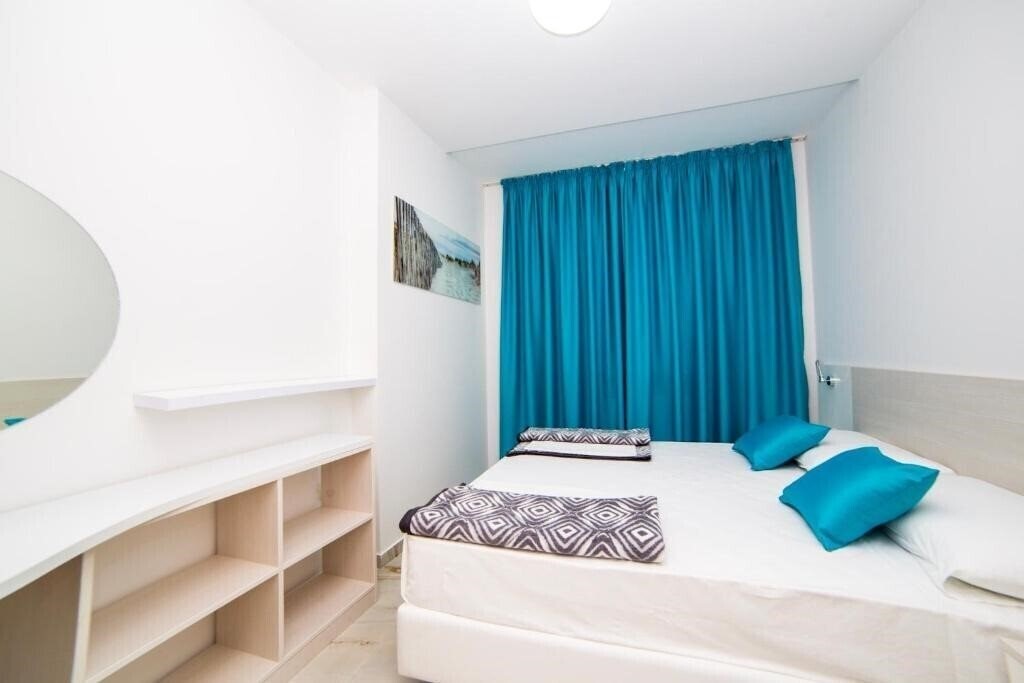 Apartments Obala Aura 4* суреті