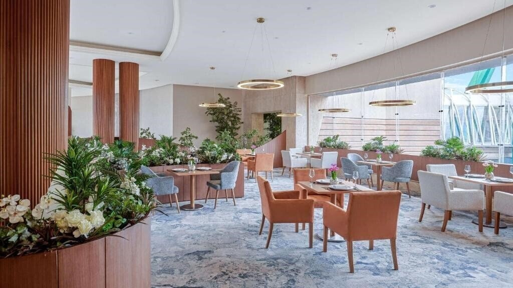 Изображение Hilton Green Plaza 5*