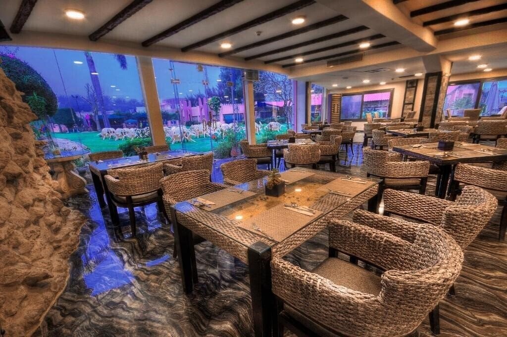 Africana Hotel & Spa 3* суреті