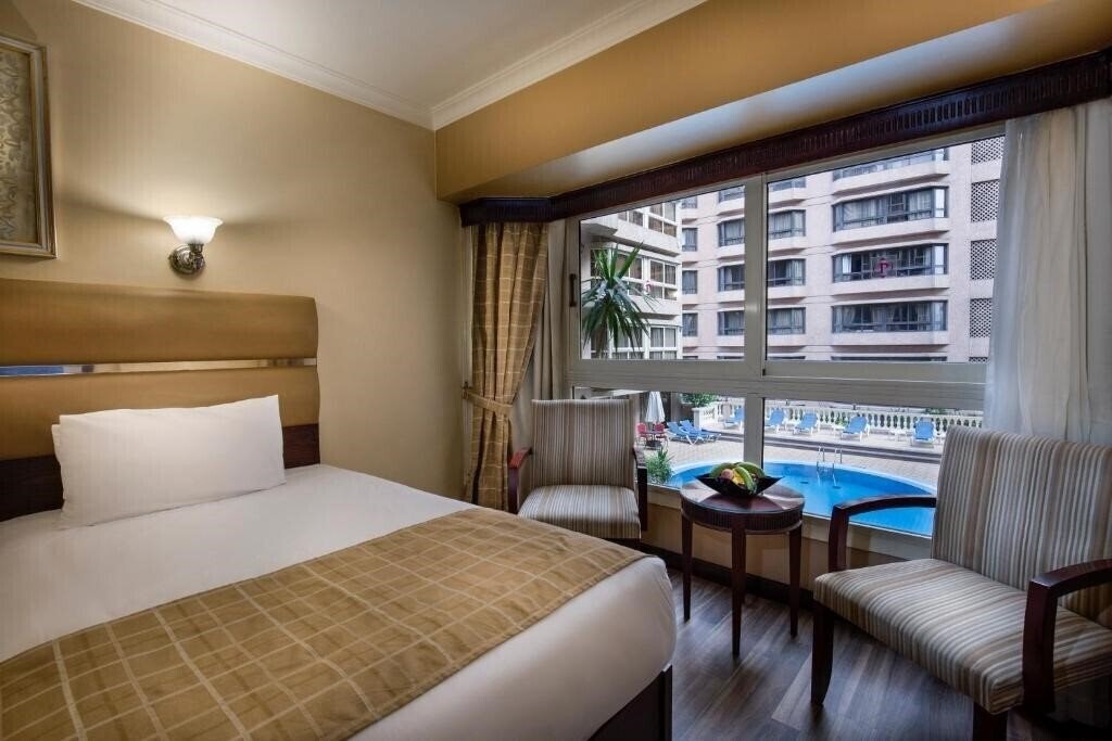 Фото Pyramisa Suites Hotel Cairo 5*