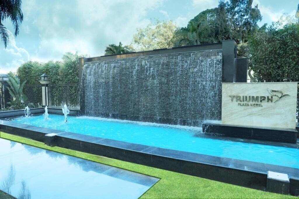 Фото Triumph Plaza Hote 4*