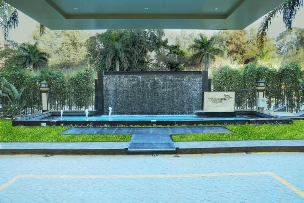 Фотография Triumph Plaza Hote 4*