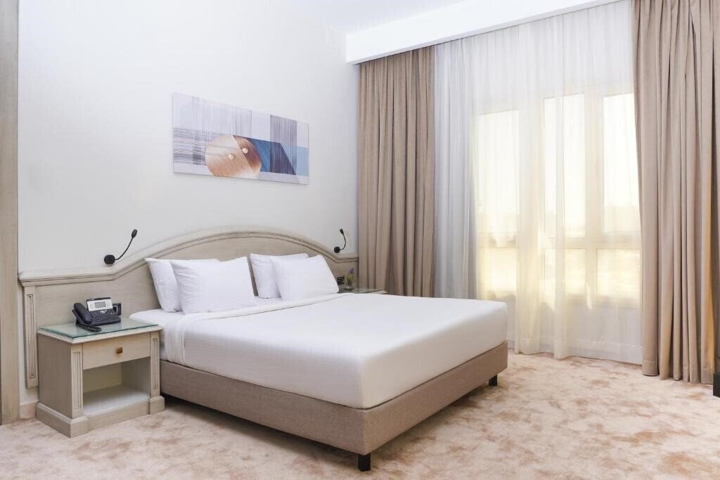 Картинка Triumph Plaza Hote 4*