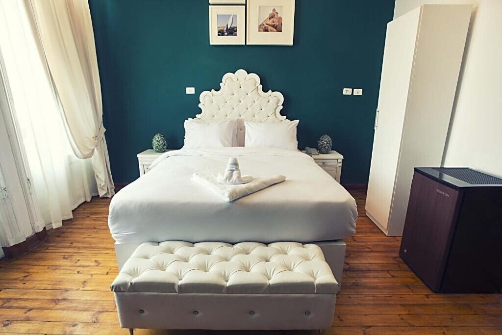 Фото Tahrir Plaza Suites 3*