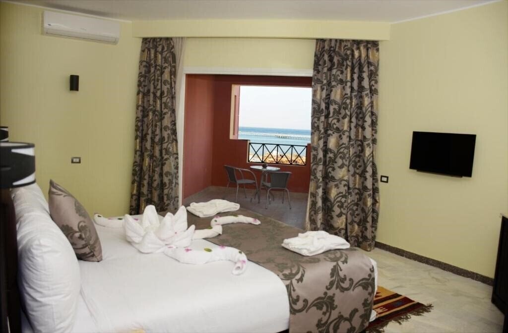 Фото Casa Mare Resort (ex. Royal Tulip Beach Resort ) 5*