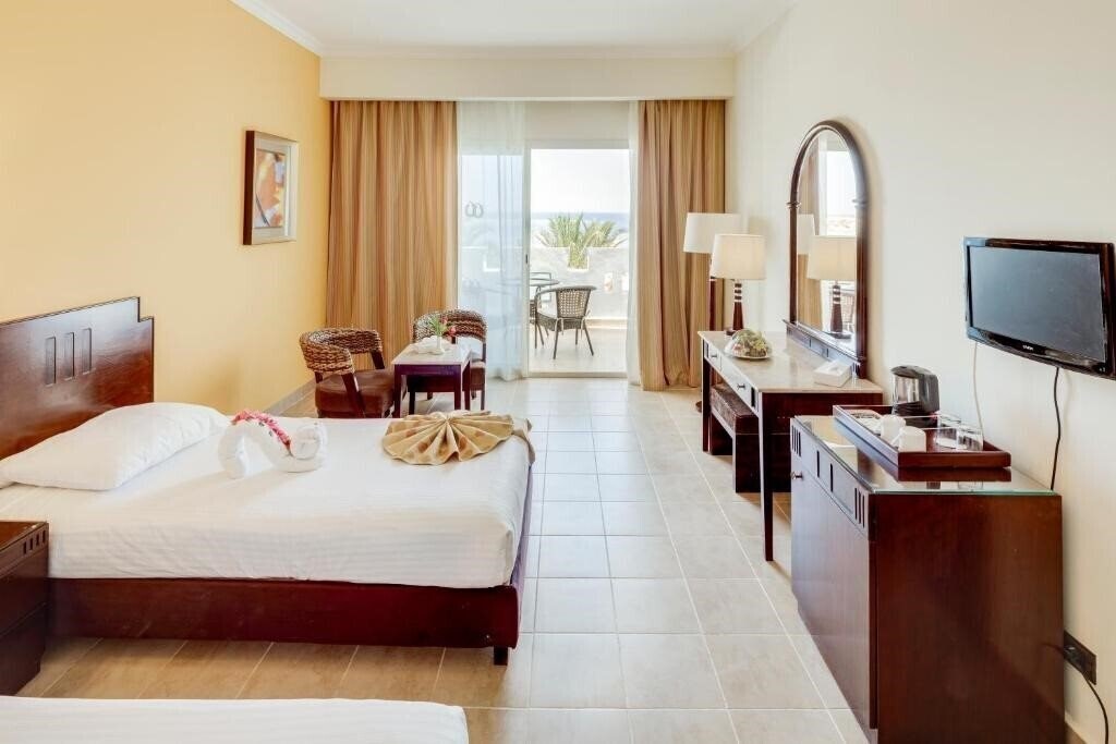 Фото Coral Sun Beach 4*