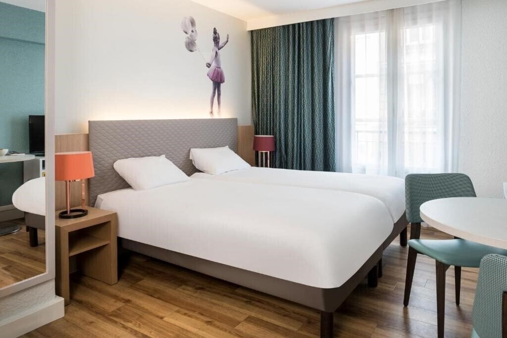 Adagio Aparthotel Paris Montmartre 3* фотосуреті