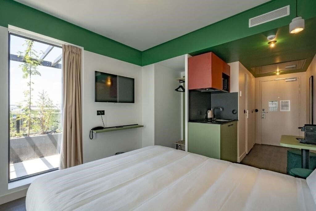 Фото All Suites Appart Hotel et Hotel Paris 13 Porte d'Italie 3*