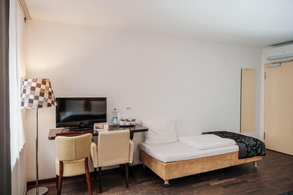 Helvetia Hotel Munich City Center 3* суреті