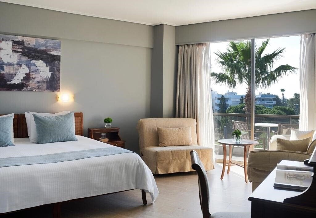 Фото Golden Sun Hotel Athens 4*