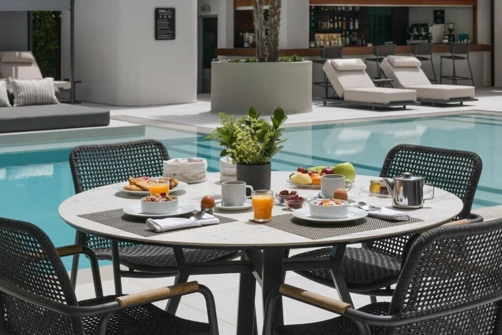Изображение Blazer Suites 4*
