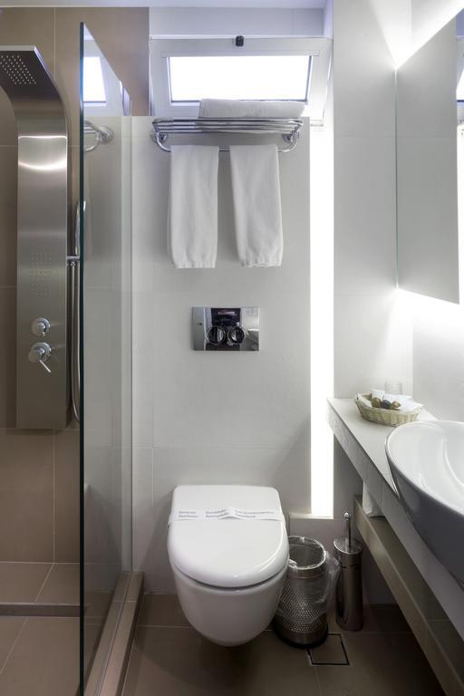 Фото Coral Hotel Athens 4*