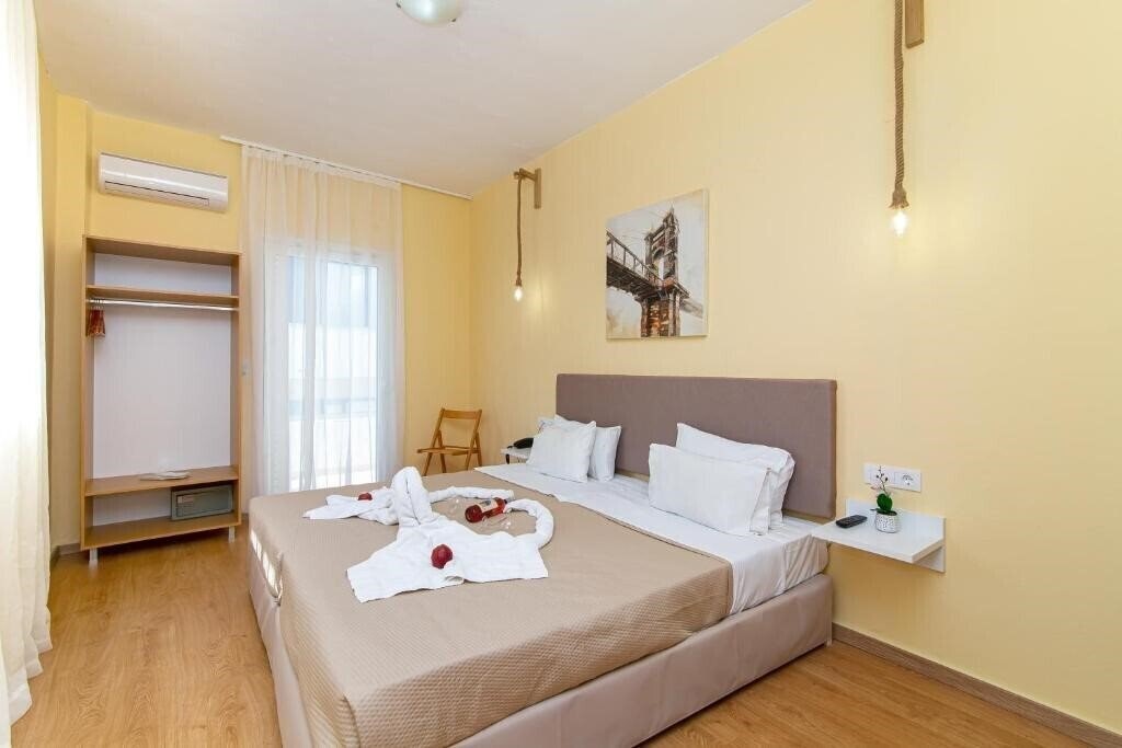 Triton Hotel 3* суреті
