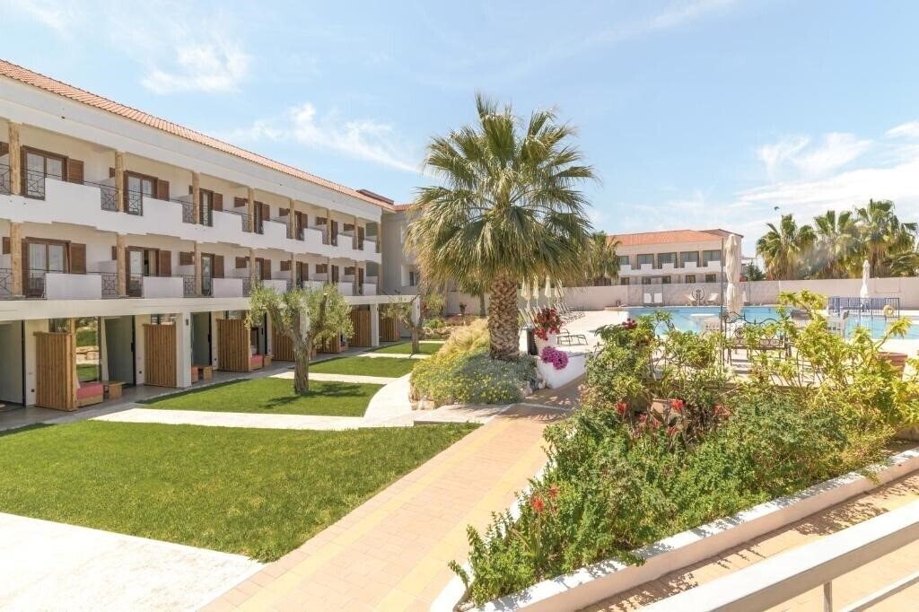 Фото Tresor Sousouras (ex. Hanioti Palace) 4*