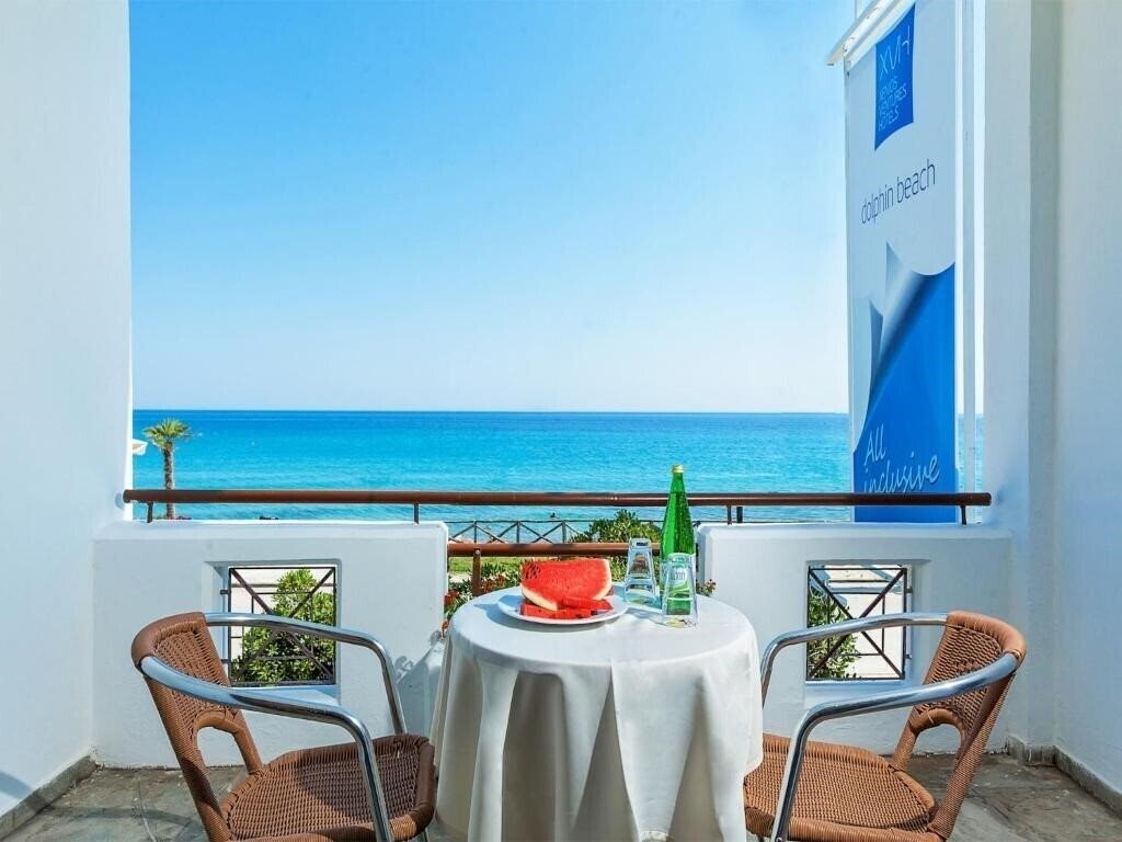 Изображение Xenios Dolphin Beach 3*