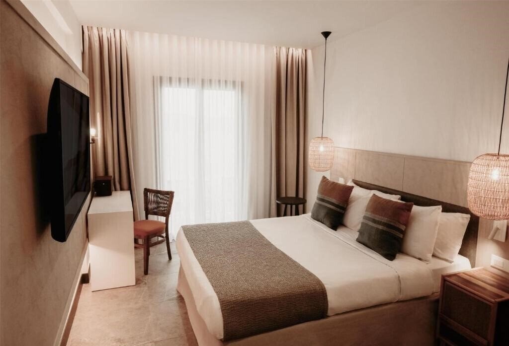 Фото Domes Aulus Elounda Curio Collection by Hilton 5*