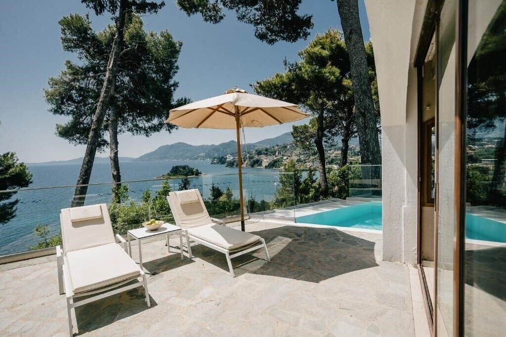 Фото Corfu Holiday Palace (ex. Aquis Corfu Holiday Palace) 5*