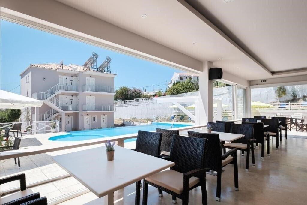 Kouros Apartments & Studios 4* қонақ үйі