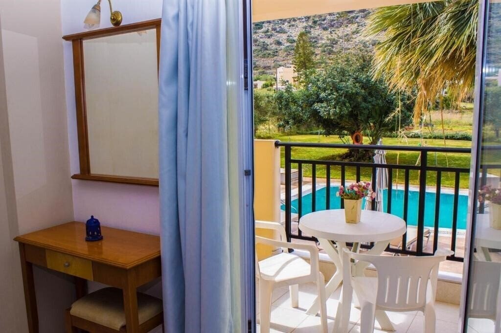 Картинка Sunshine Studios Apartments 2*