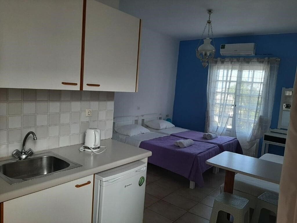 Фотография Remi Studios & Apartments 3*
