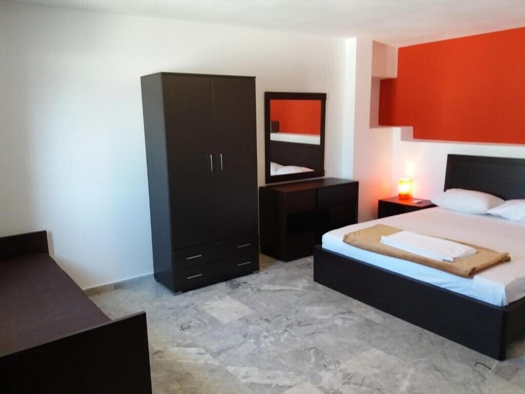 Фото Manos Apartments апартаменты