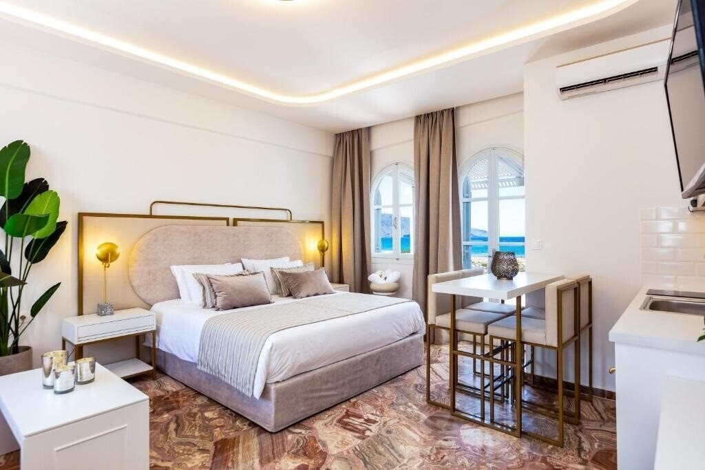 Фото Pinelopi Beach Suites Rethymno 4*