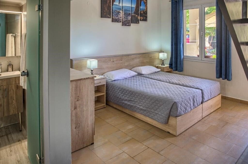 Отель Haraki Sand Beach Studios 3*