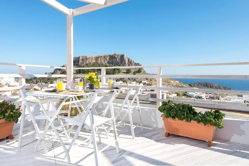 Отель Lindos Harmony Suites 4*