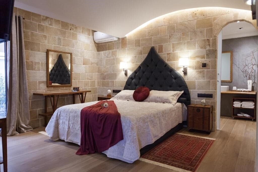 Utopia Luxury Suites 4* суреті