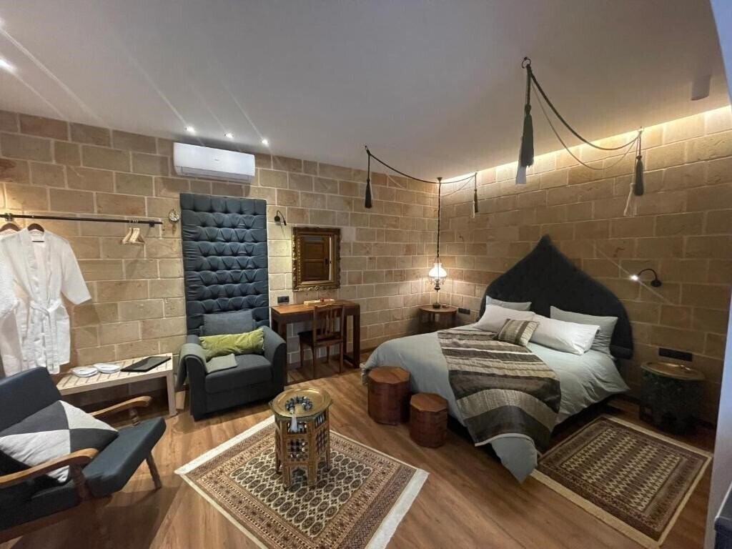 Utopia Luxury Suites 4* суреті