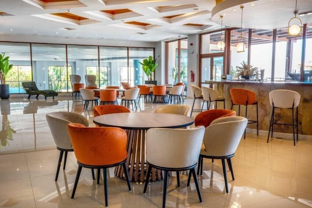 Mythos Beach Resort 5* суреті