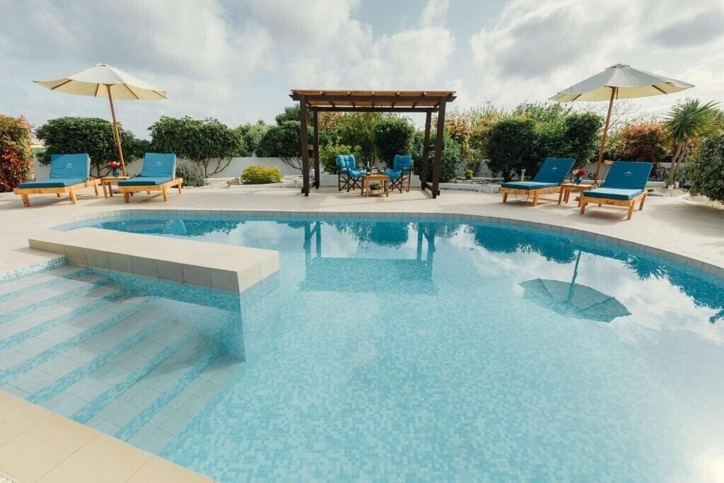 Отель Gennadi Dreams Luxury Apartments 4*