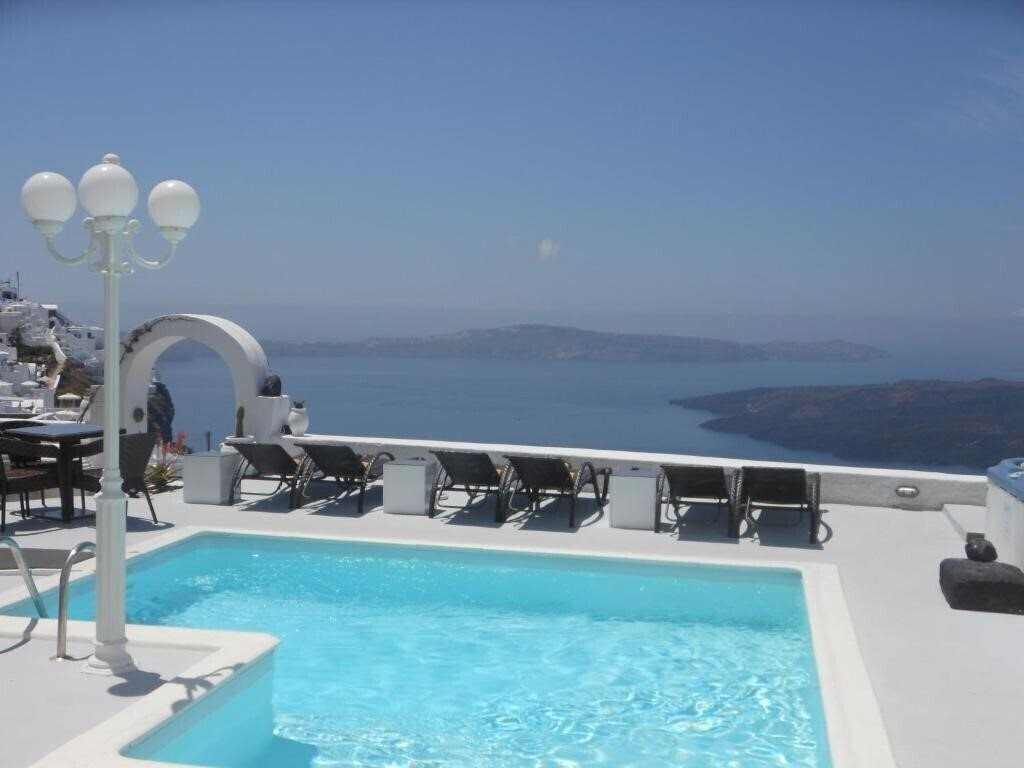 Nomikos Villas 4* қонақ үйі