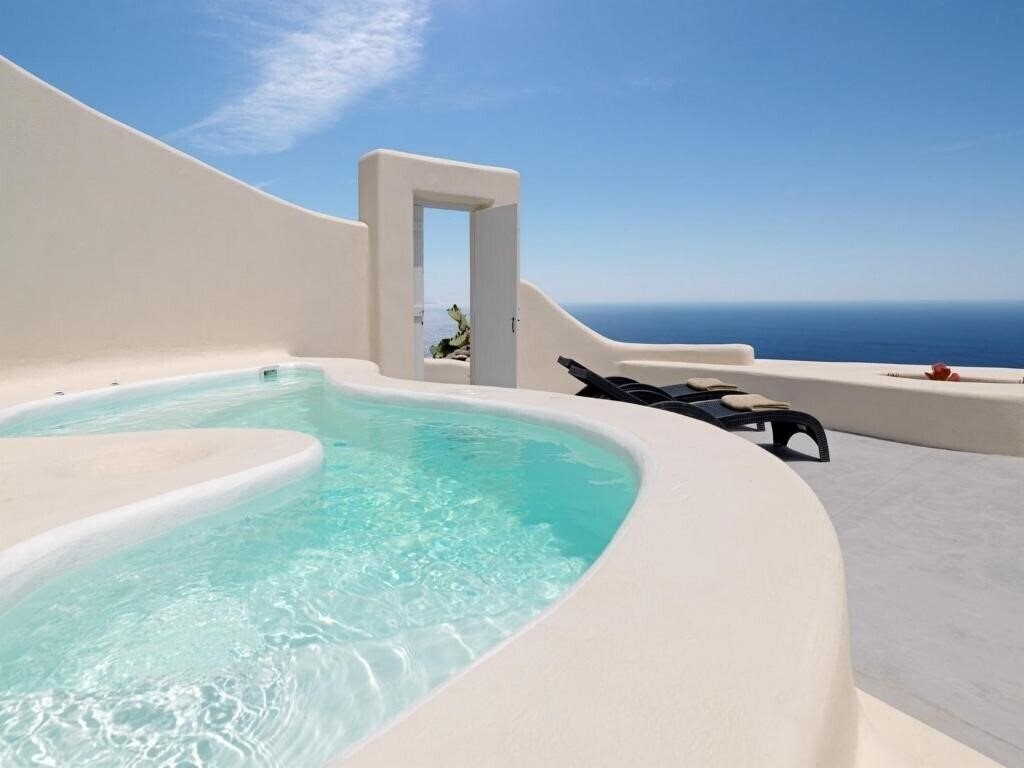 Domes Novos Santorini 5* фотосуреті
