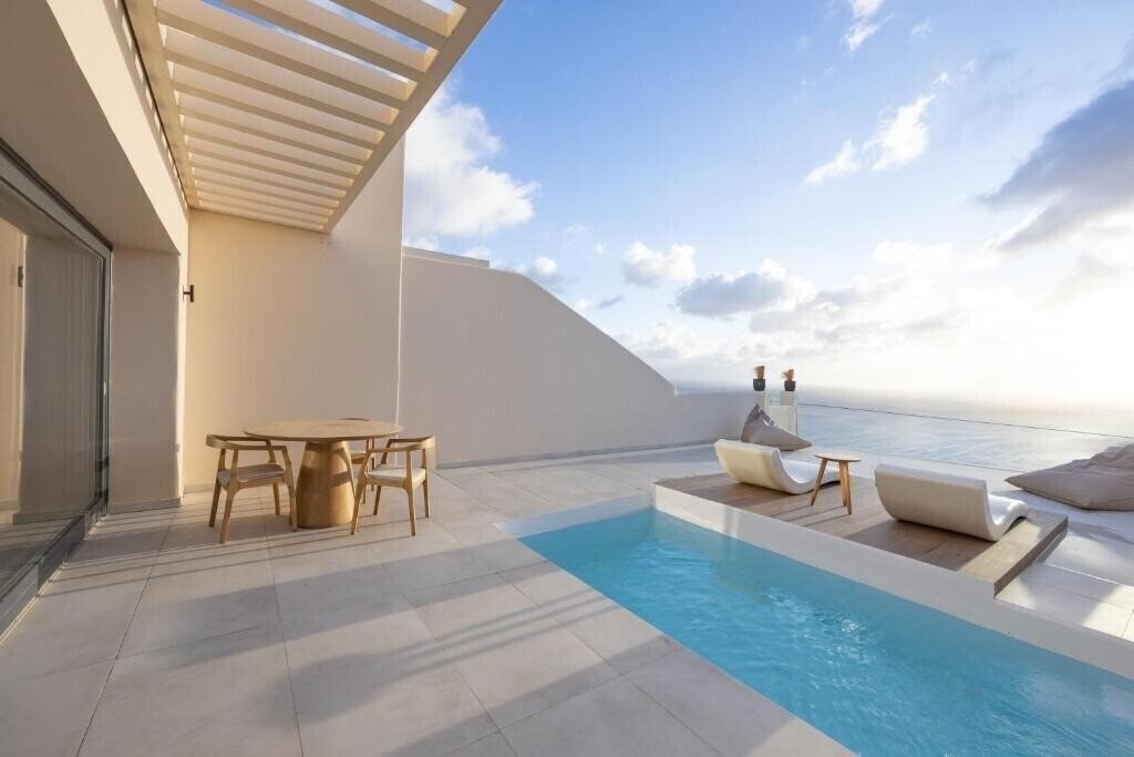 Pnoi Luxury Suites 3* суреті
