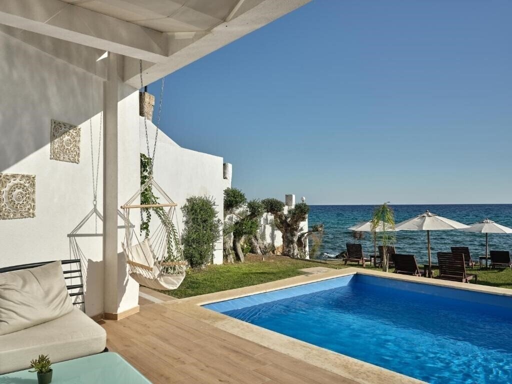 Изображение Cavo Orient Beach Hotel & Suites 4*