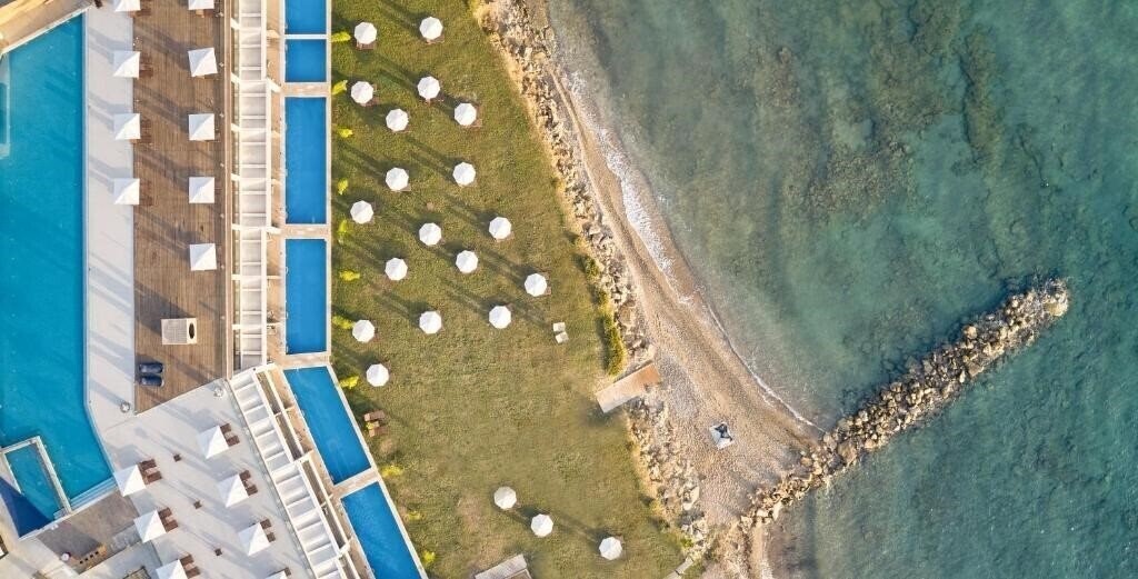 Картинка Cavo Orient Beach Hotel & Suites 4*