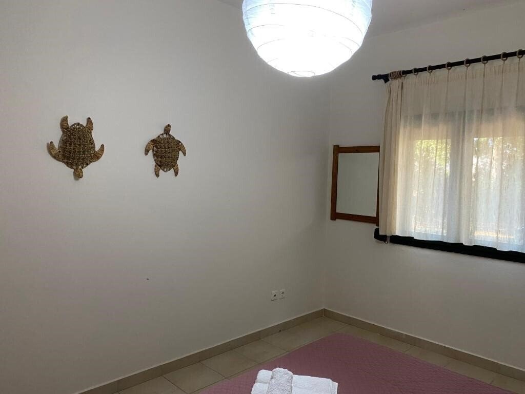 Theros Apartment 4* фотосуреті