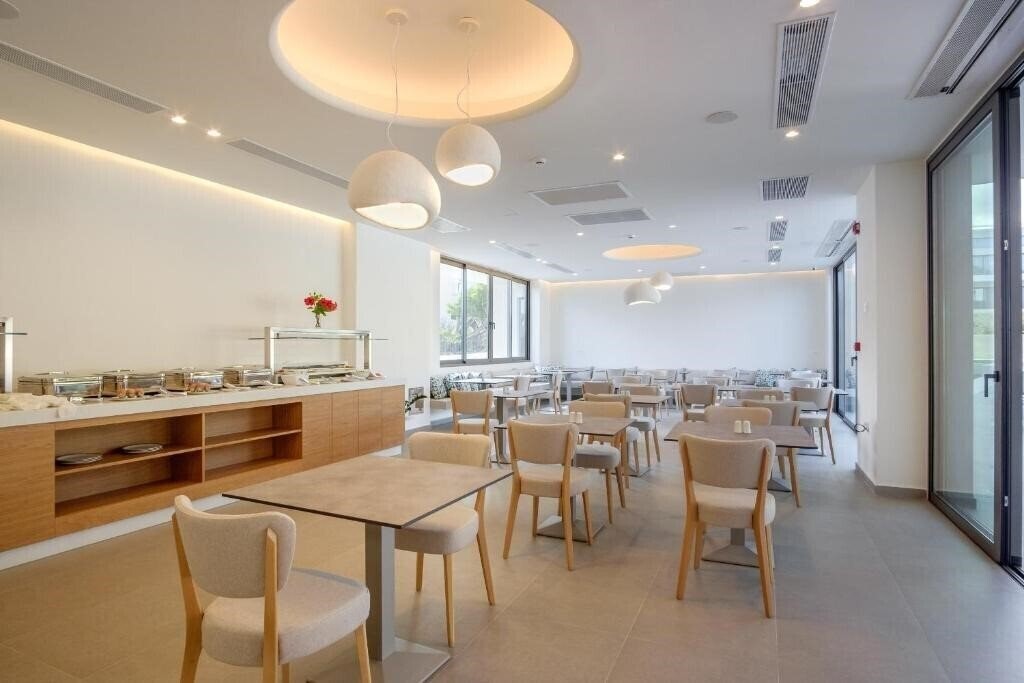 Фотография Phos Hotel 4*