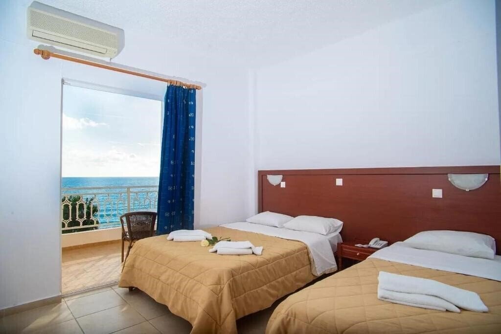 Poseidon Beach Hotel 4* фотосуреті