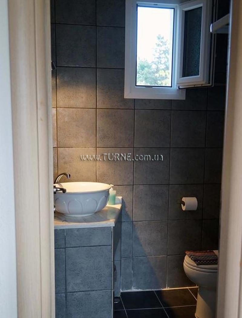 Фото Lofos Vourvourou Apt апартаменты