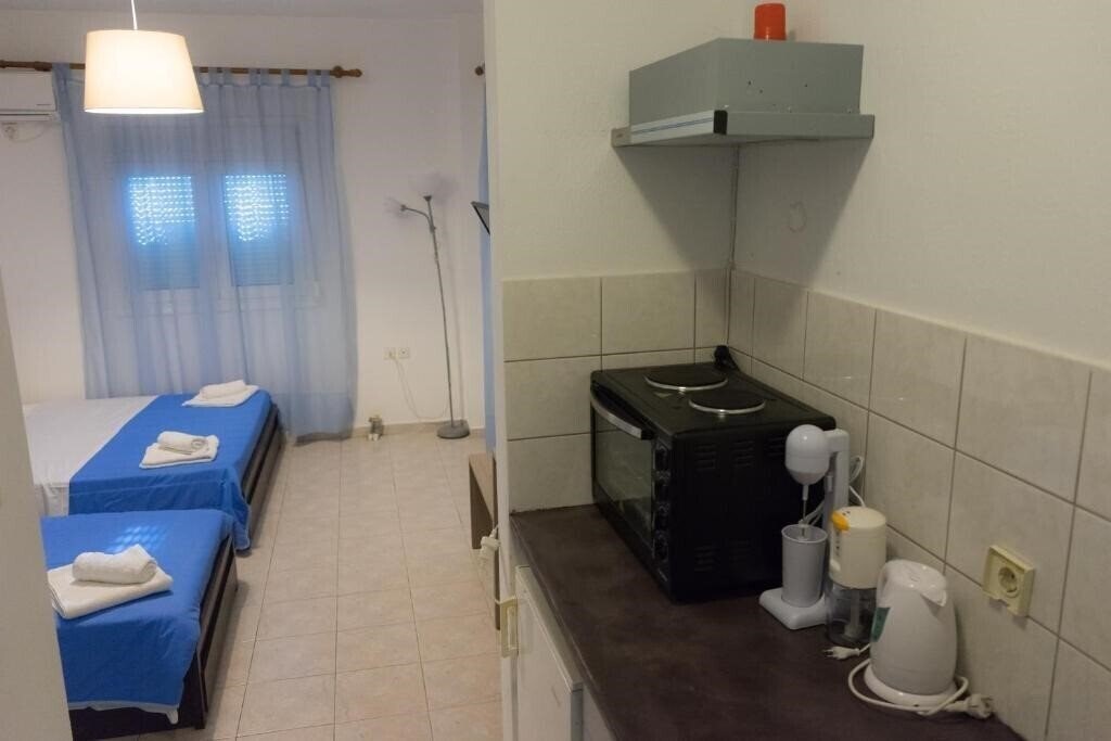 Polykratis Rooms Apart Hotel 4* фотосуреті