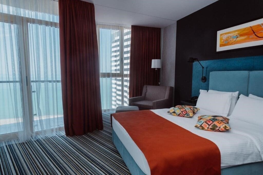 Отель Tangerine Apart Hotel 4*